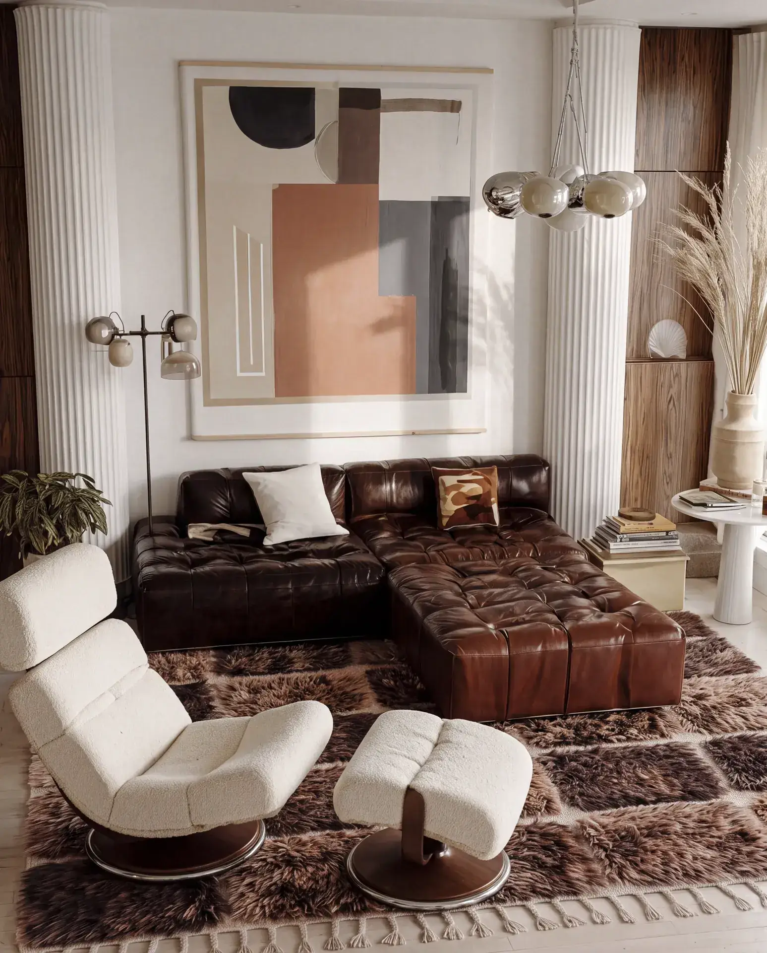 Tadla Chocolate & Brown hand-knotted Beni Mrirt rug in a living room beside a brown leather sectional
