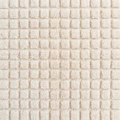 Raised ivory wool blocks with recessed channels