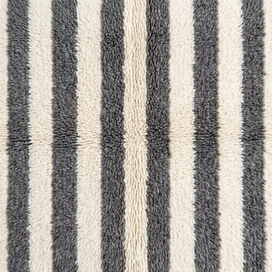 Ivory and charcoal striped hand-knotted wool pattern