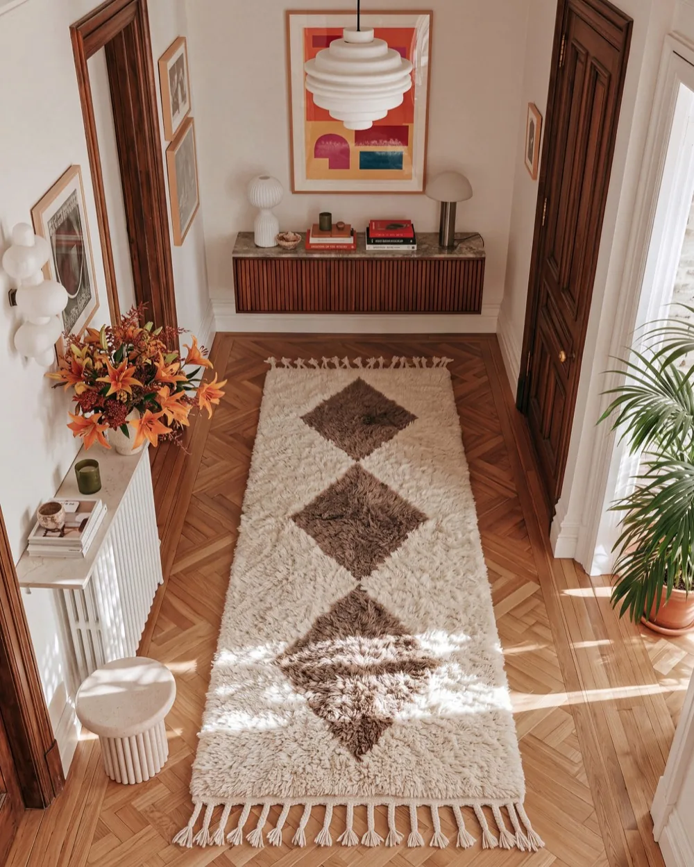 Moroccan wool rug styled in a hallway