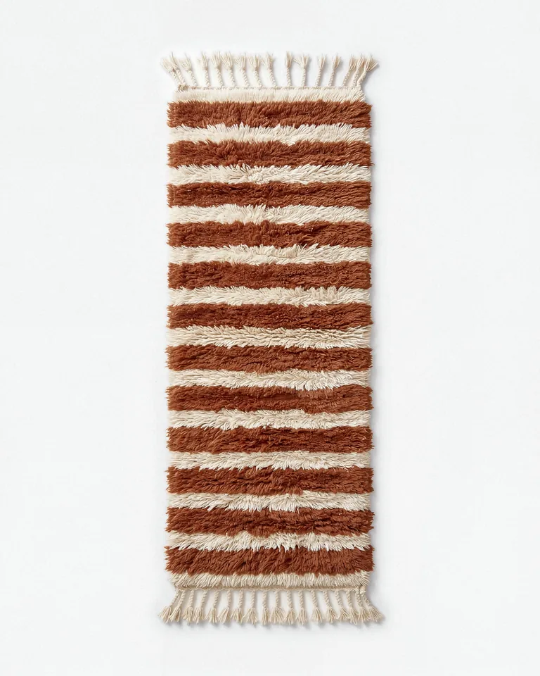Rust and ivory striped hand-knotted wool runner photographed from overhead